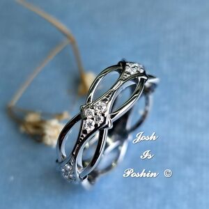 Flowing Infinity Womens Moissanite Ring In Sterling Silver